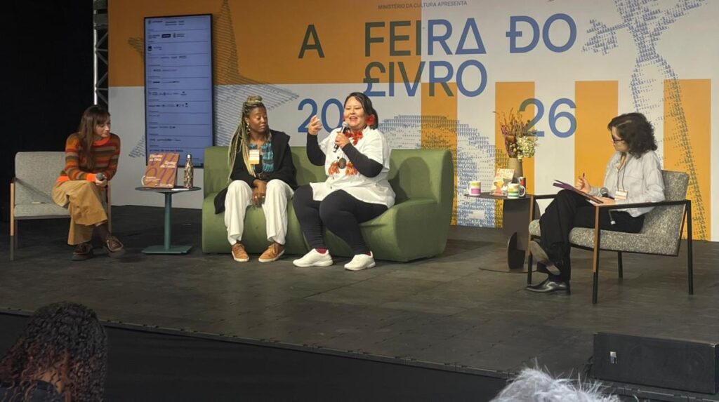 Quadro mulheres em palco de evento que discutia sobre a alimentação