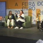 Quadro mulheres em palco de evento que discutia sobre a alimentação